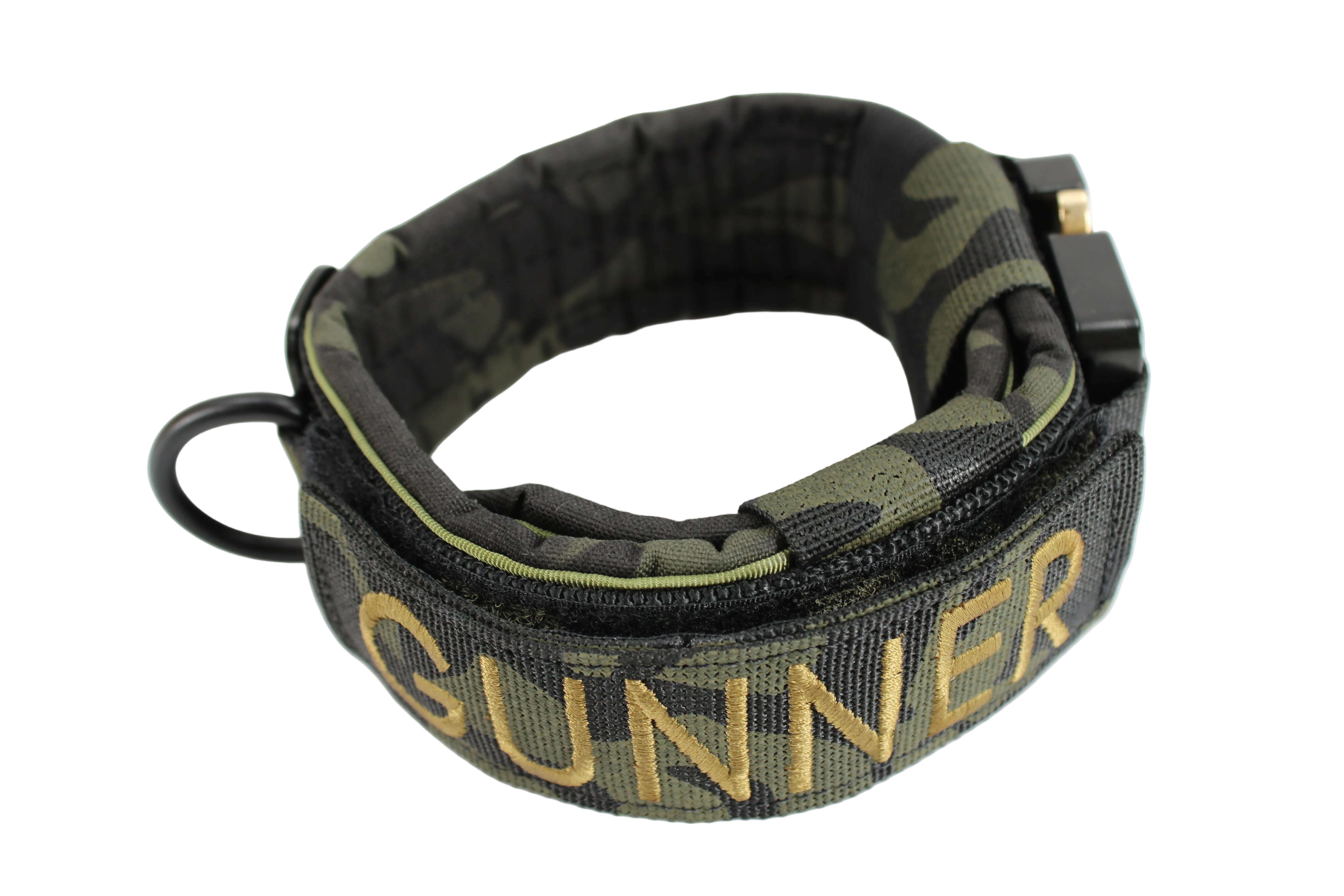 Green and black dog collar with 'GUNNER' embroidery on a white background