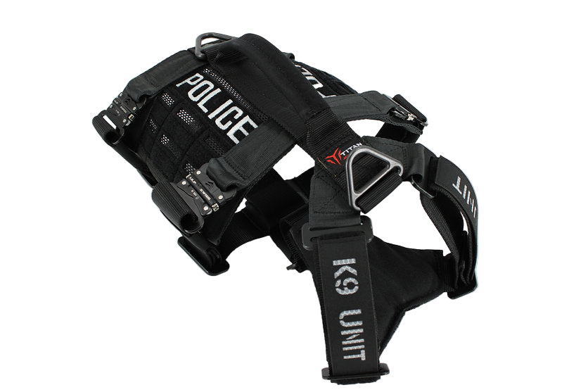 Black police dog harness with 'K9 Unit' branding on a white background