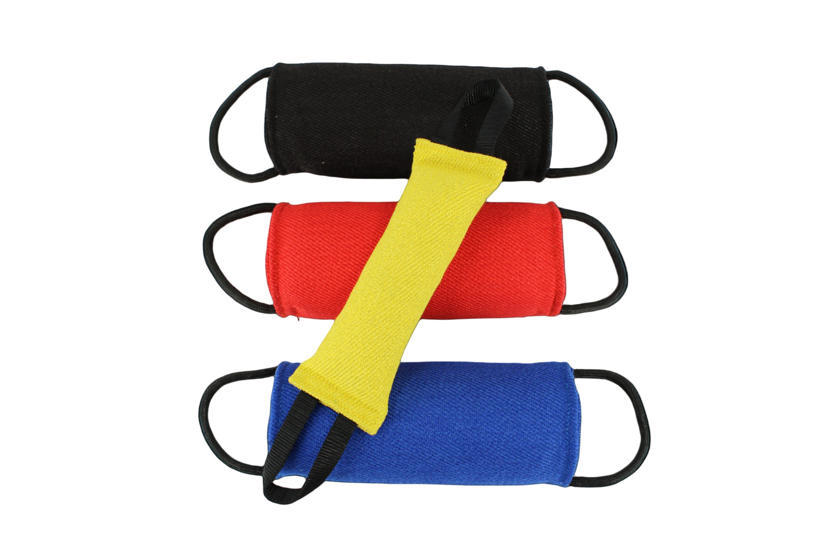 Bite Roll Pillows in three colors shown with a Tug for size comparison  by Titan Ultra K9