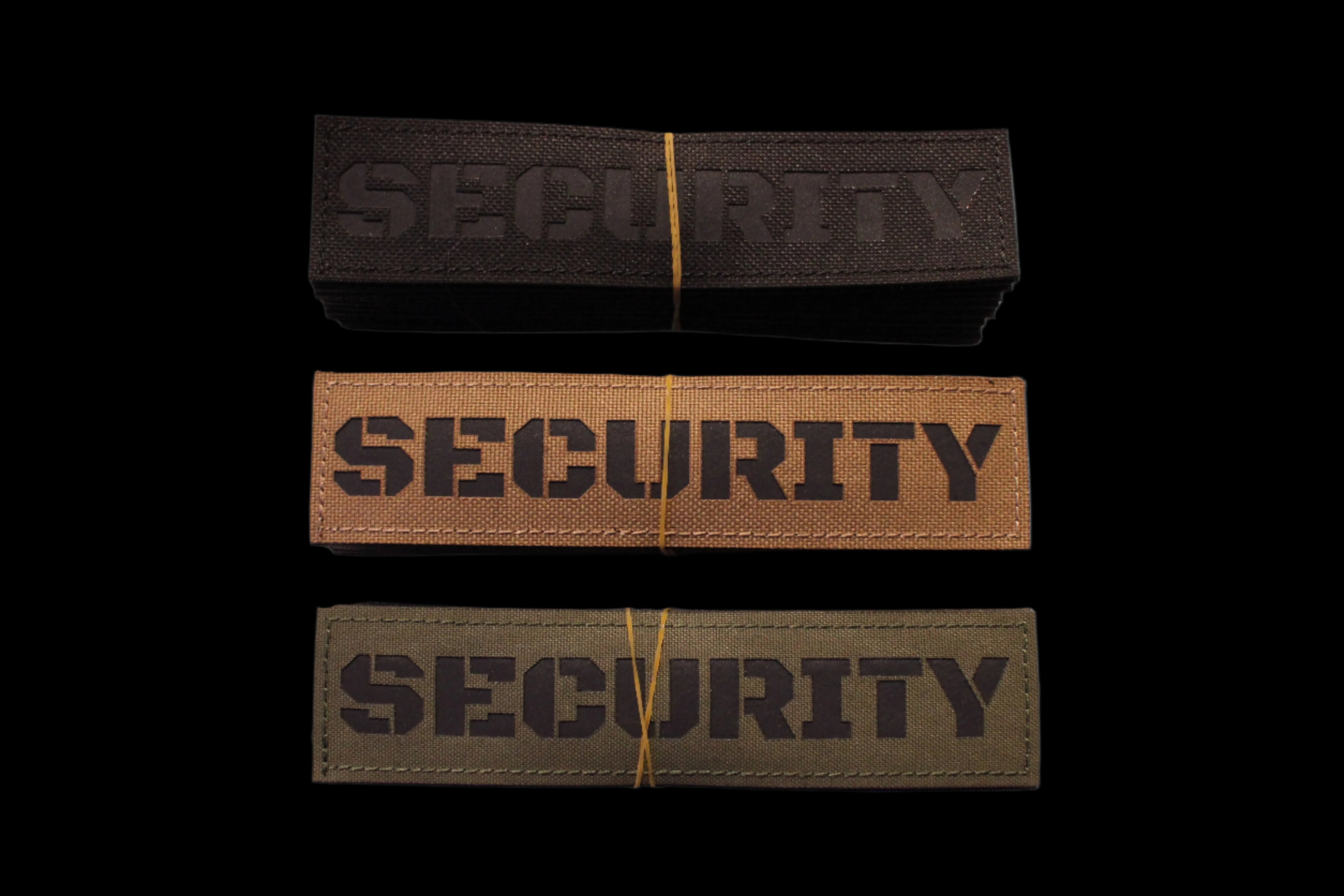 Three 'SECURITY' patches in Black, Coyote brown, and Olive Drab green