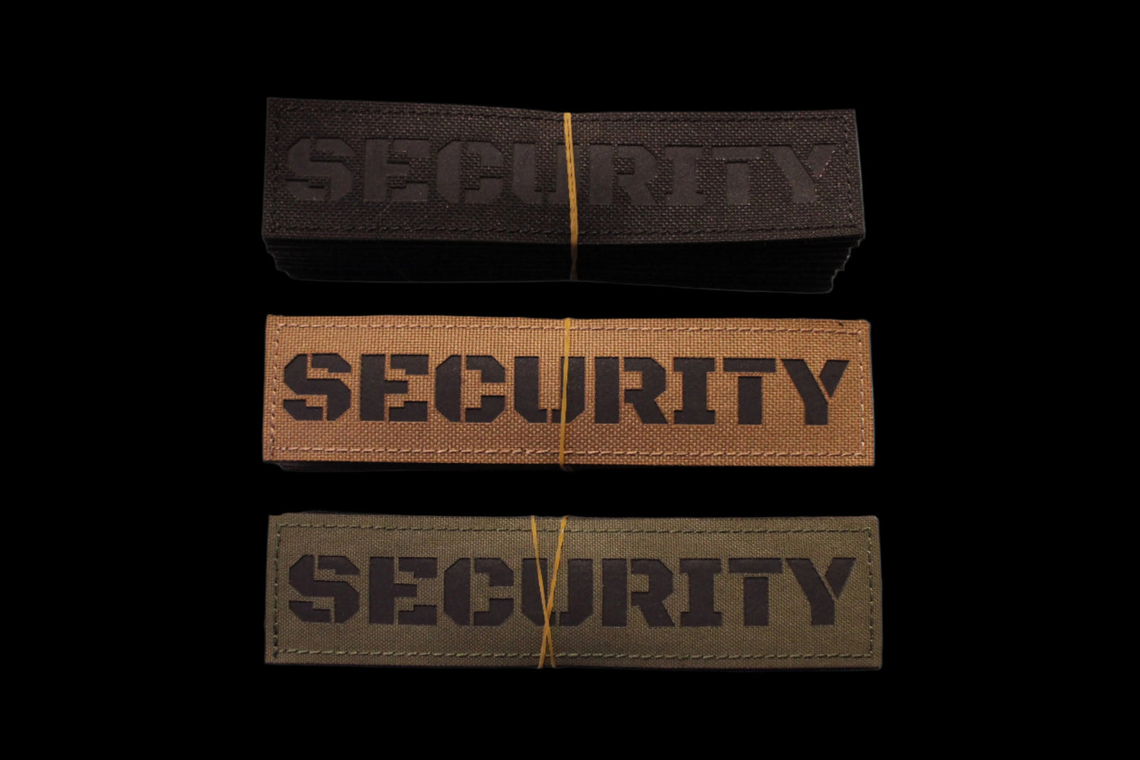 Three 'SECURITY' patches in Black, Coyote brown, and Olive Drab green