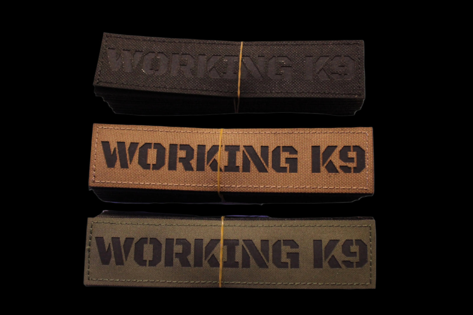 Three ID Patches with 'WORKING K9' text 